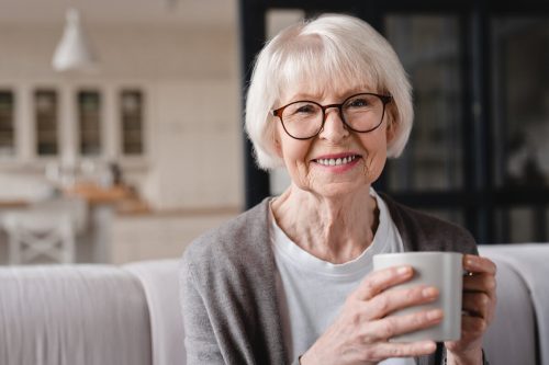 Older lady having tea